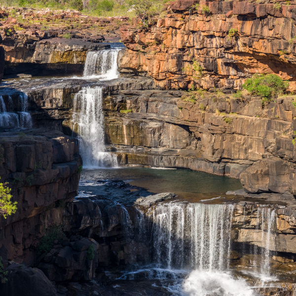 Rolling waterfalls with plenty of water at Mitchell Falls, WA