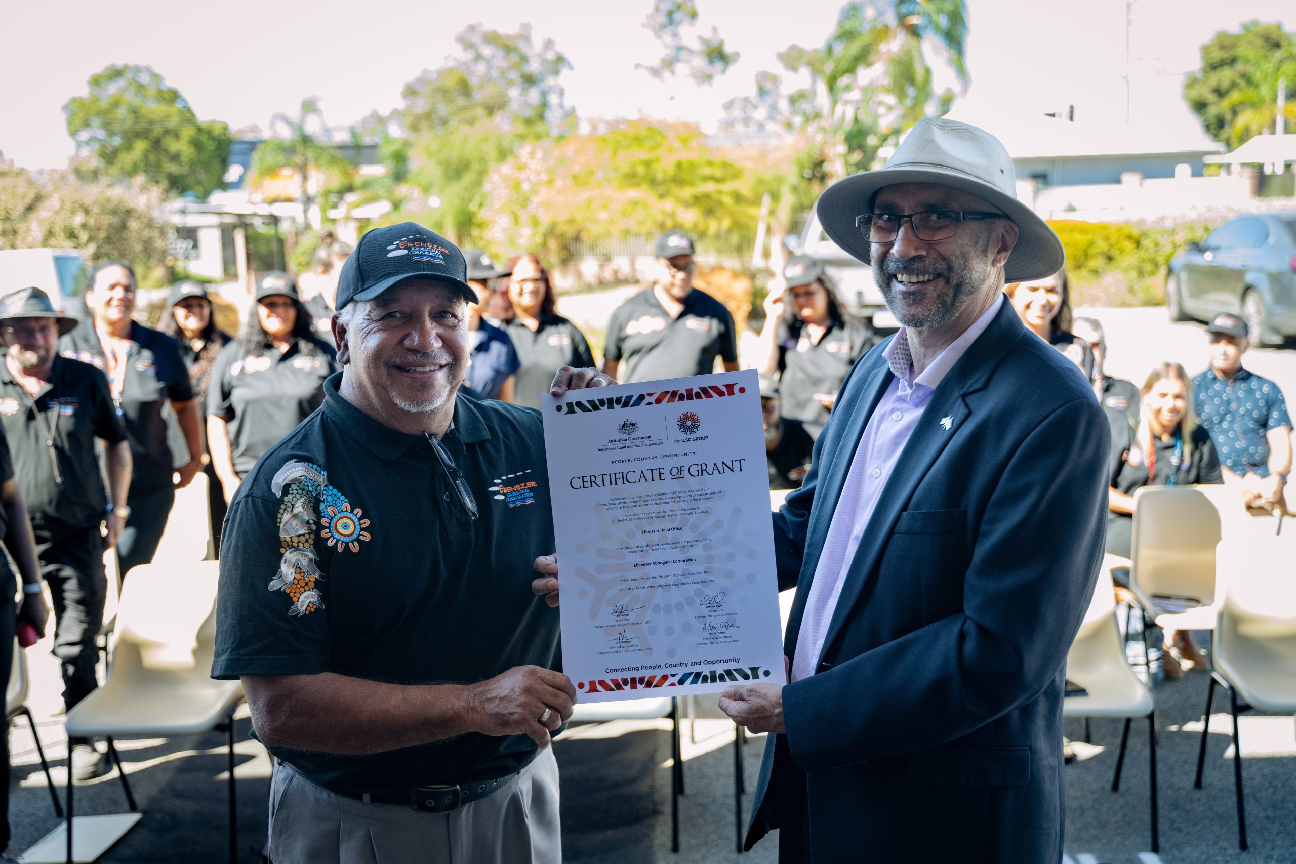 ILSC Chair Ian Hamm presenting the ILSC Certificate of Divestment to Ebenezer Chair Dennis Taylor. Photographer Cole Baxter